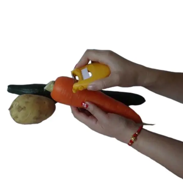 Multi-purpose Peeler With Brush
