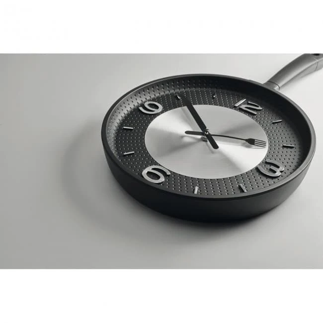 Wall clock in pan shape